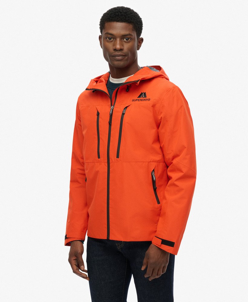 chaquetas-impermeables-756nws-1.jpg Hombre Chaqueta impermeable en naranja intenso | Superdry ES - Imagen 1